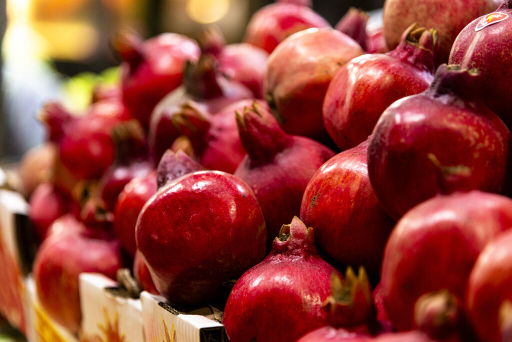 Ramallah Palestine - A colorful stand of pomegranates.