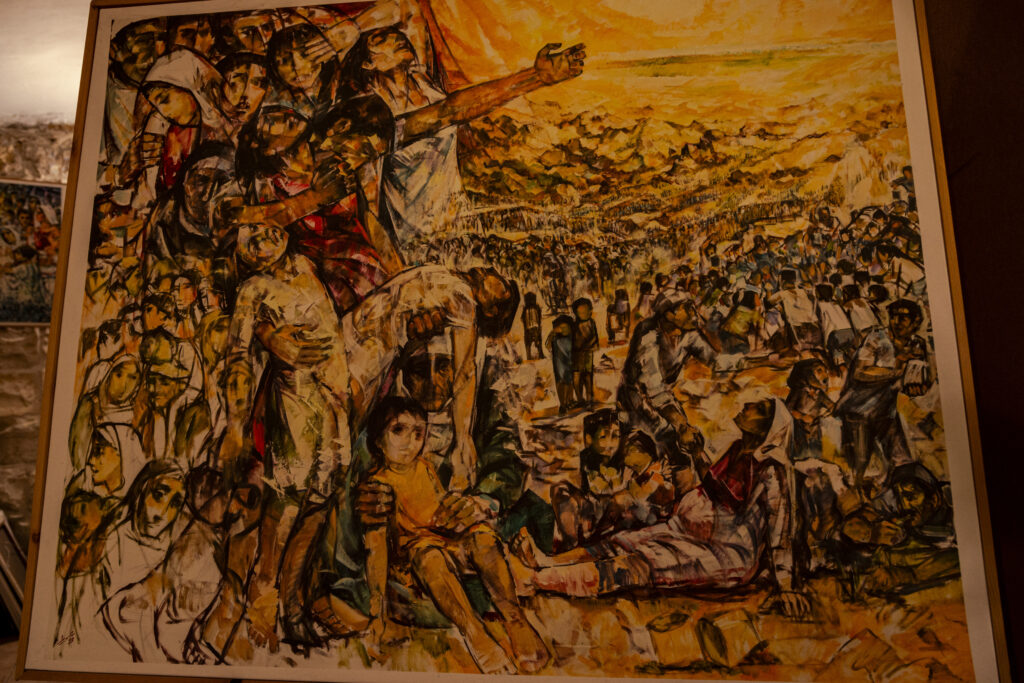 A painting inside the Dar Zahran house museum depicts the Palestinian exodus through the desert during the ethnic cleansing of 1948, when hundreds of thousands of Palestinians were forced to flee their homes. The painting depicts dozens of women and children suffering from hunger and thirst in the desert.